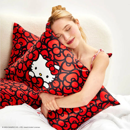 kitsch x Hello Kitty Satin Pillowcase in Kitty Bathes in a Sea of Bows - King