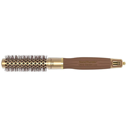 Close-up of the bristles on a Olivia Garden NanoThermic Round Thermal hair brush, showing a mix of black and brown bristles designed for hair styling.
