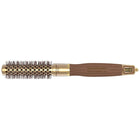 Close-up of the bristles on a Olivia Garden NanoThermic Round Thermal hair brush, showing a mix of black and brown bristles designed for hair styling.