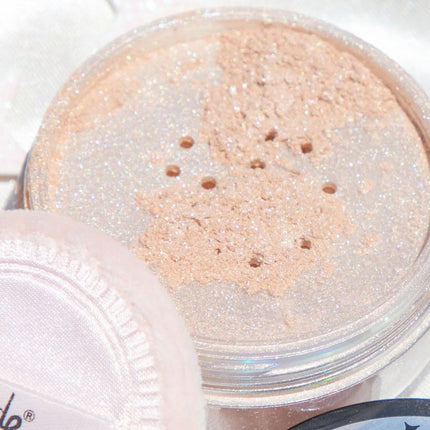 rude-cosmetics-moon-halo-face-body-shimmer-8